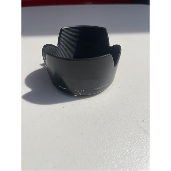 Genuine NIKON HB-34 LENS HOOD SHADE Fits NIKON AF-S DX 55-200MM F4-5.6G ED - Picture 1 of 2
